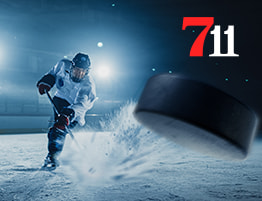 Hockeywedstrijd en een 711 Casino logo